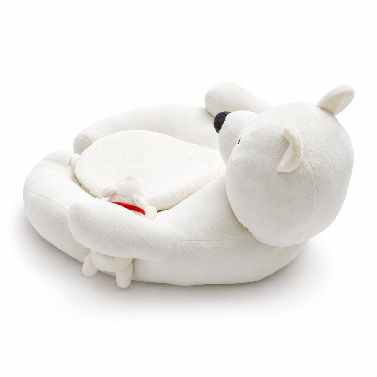 Rear three-quarter view of a white polar bear pet sofa