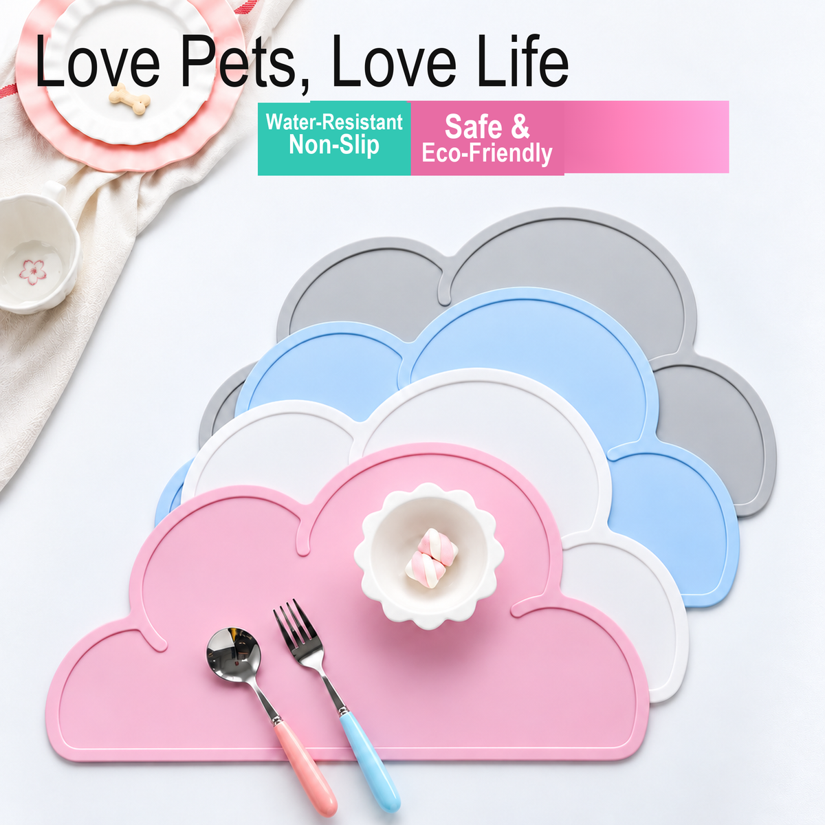 Revised English lifestyle image showing colourful cloud silicone pet bowl mats