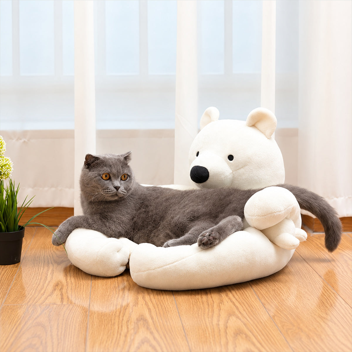Gray cat lounging on a white polar bear pet sofa