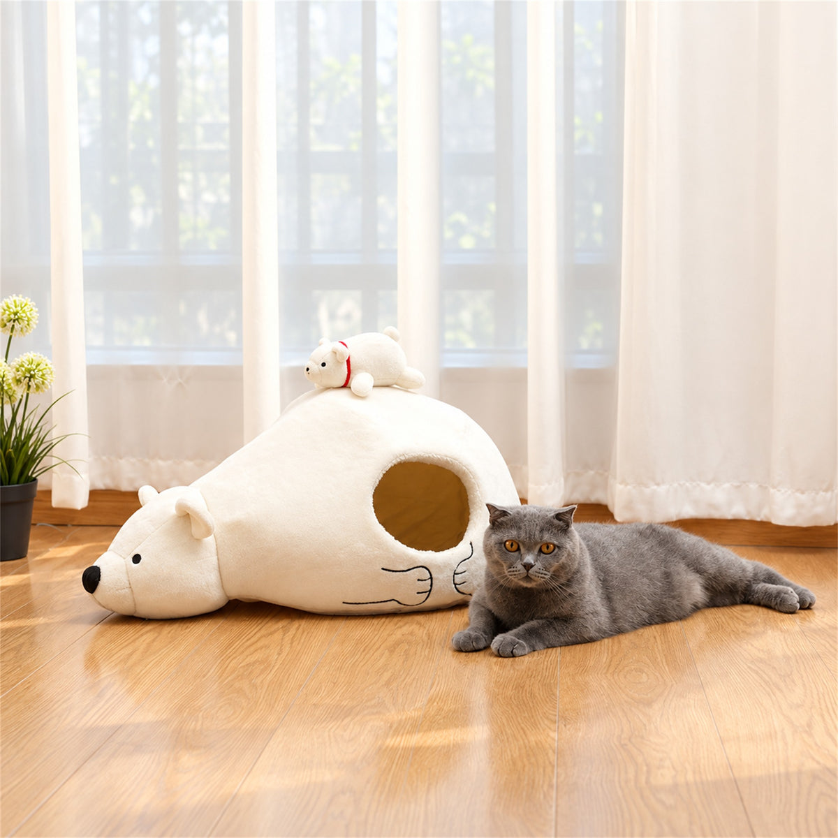 Gray cat relaxing beside a white polar bear pet cave bed