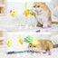 Cat playing with colorful FOFOS cat scratcher attachments on a board
