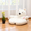 White polar bear pet sofa in a bright home setting