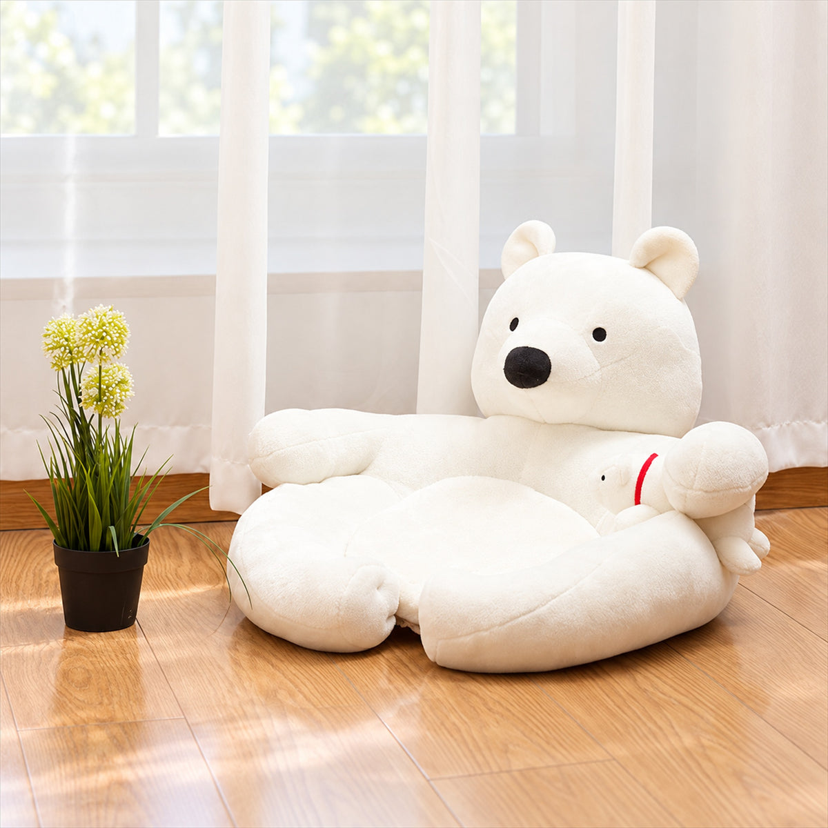 White polar bear pet sofa in a bright home setting