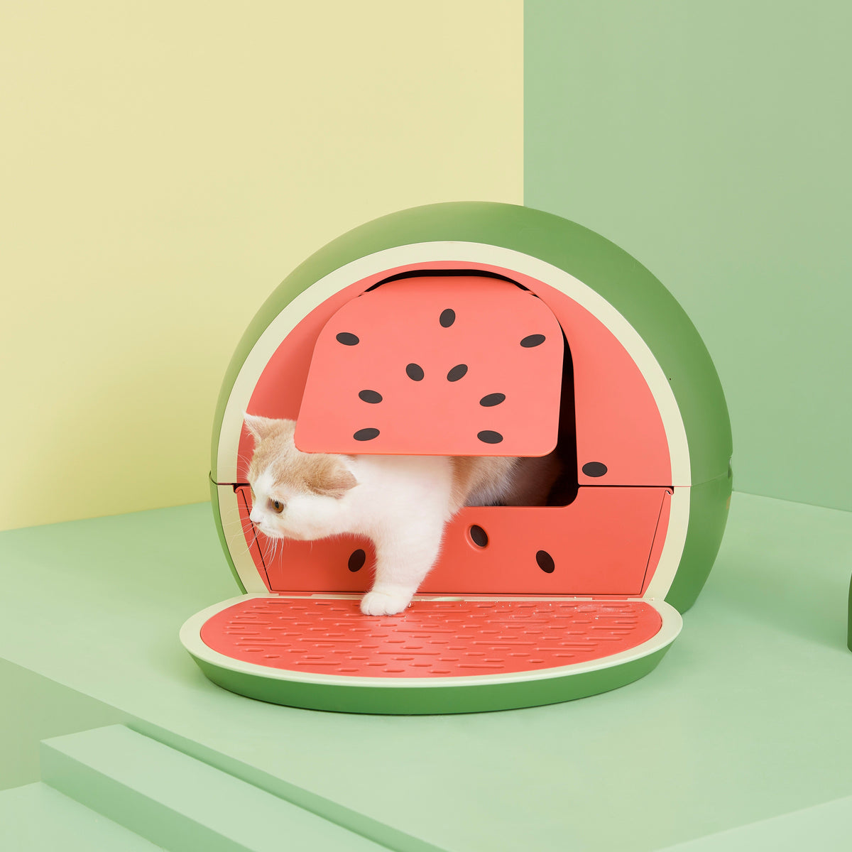 VETRESKA Fruity Kitty Kove Litter Box - Watermelon design lifestyle view in a playful cat space [Gallery: Watermelon]