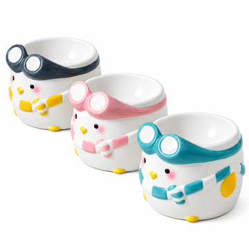 Penguin Ski Ceramic Pet Bowl | clean white SKU hero | FULL_FRAME_OUTPAINT | collection batch1