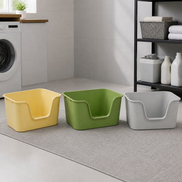Hoopet XL and XXL open cat litter boxes in yellow green and grey in a modern utility room