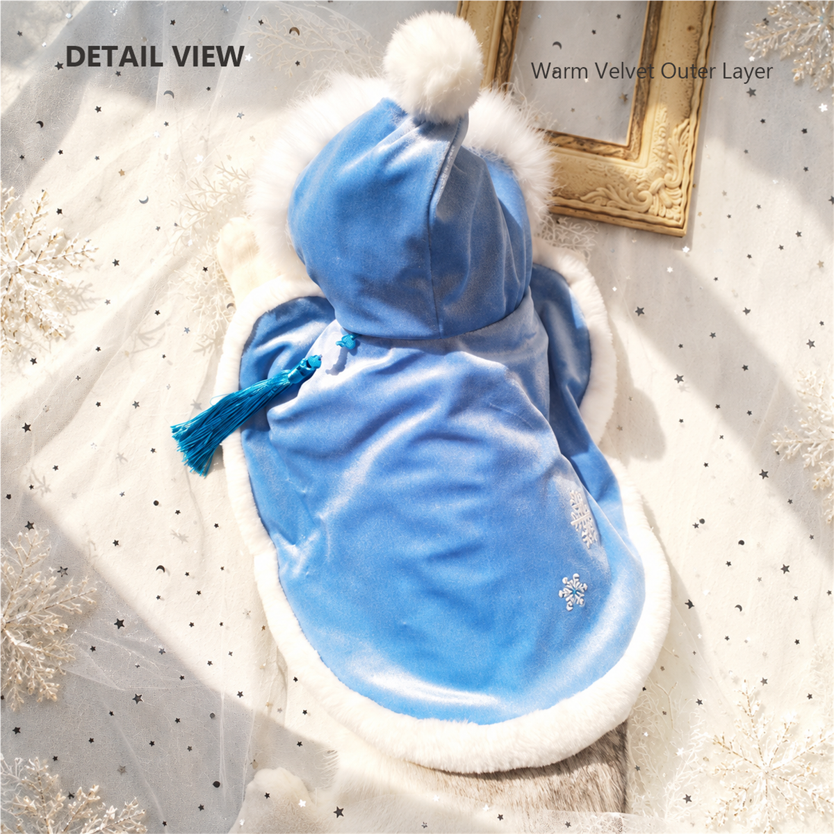 Close-up of ice blue cat cape with soft velvet outer layer