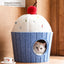 Blue cupcake-shaped cat house with a cat inside and colourful comfort details [English revision]