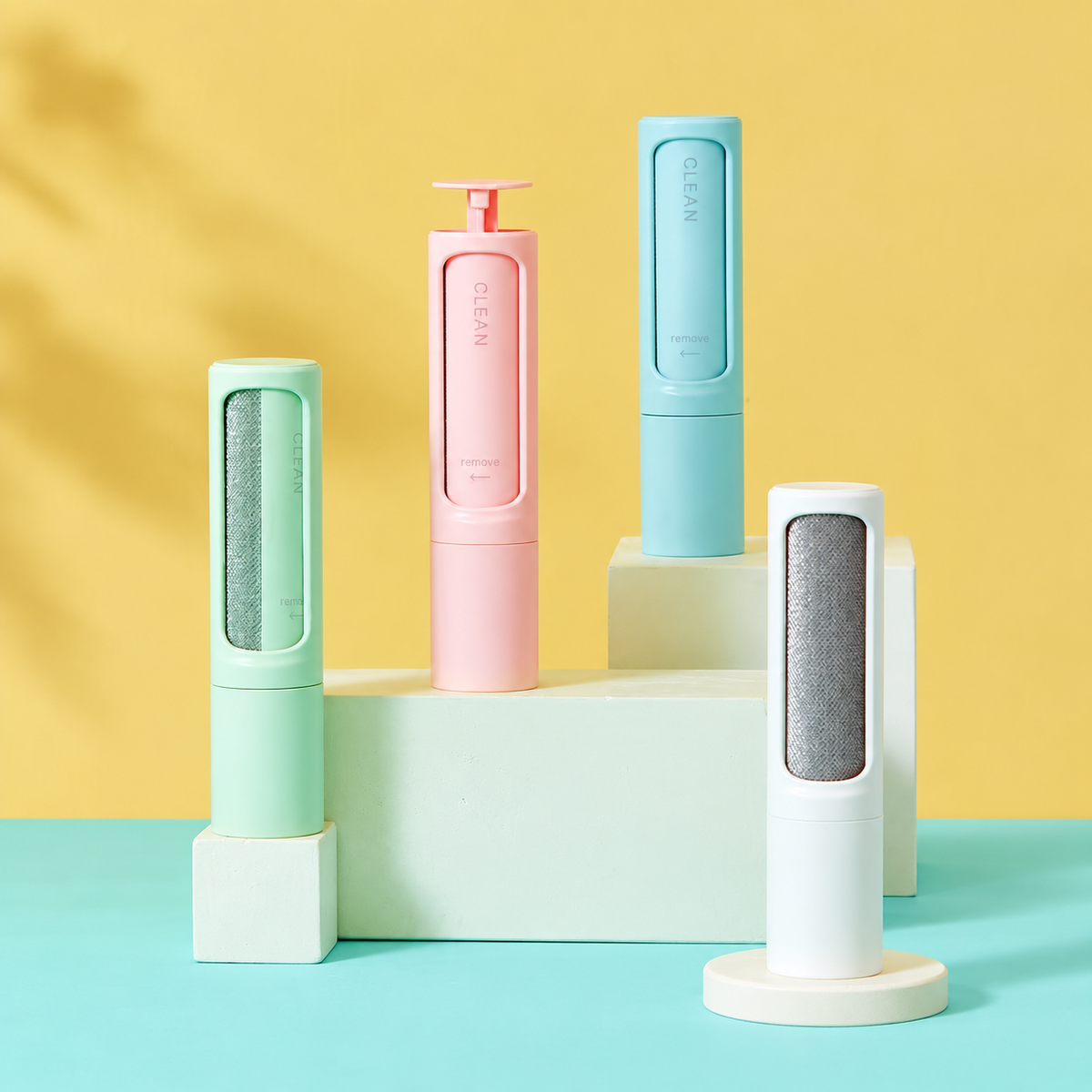 Four-color portable pet hair remover rollers displayed upright