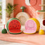 Vetreska Fruity Kitty Kove litter boxes in Watermelon and Grapefruit styles in a playful bright designer cat corner