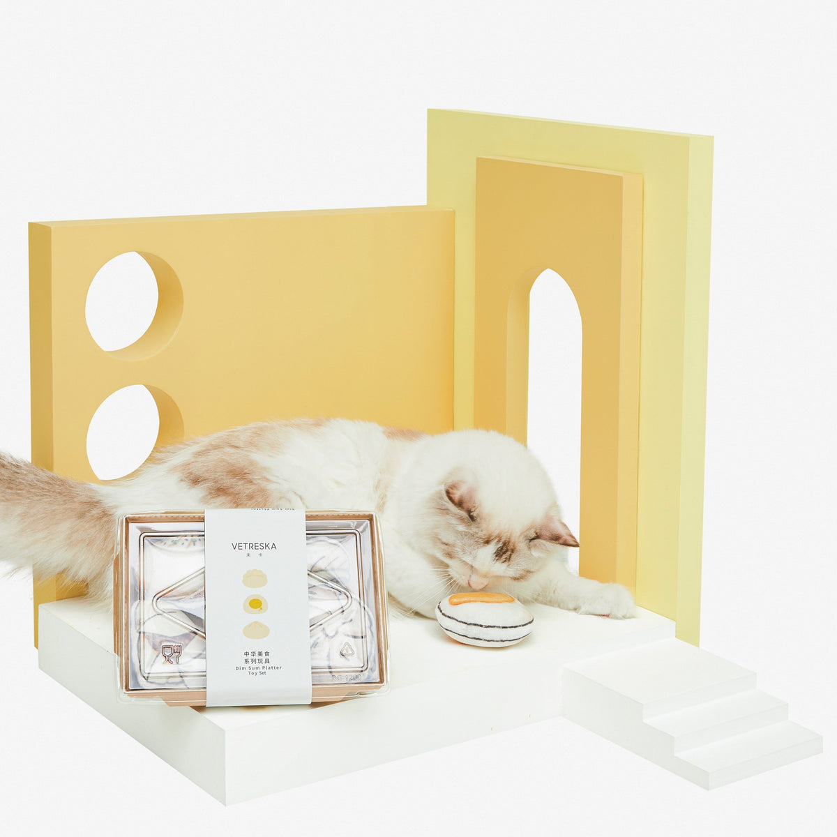 Close-up of Vetreska Chinese dim sum plush cat toys in a gift box