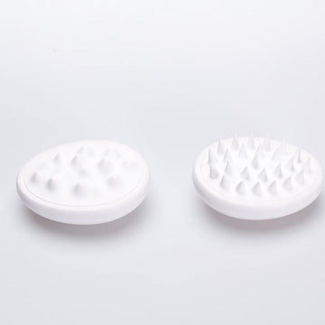 Pidan Mountain Style and Peak Style Silicone Cat Massage Brushes on a clean background [Gallery: Shared]